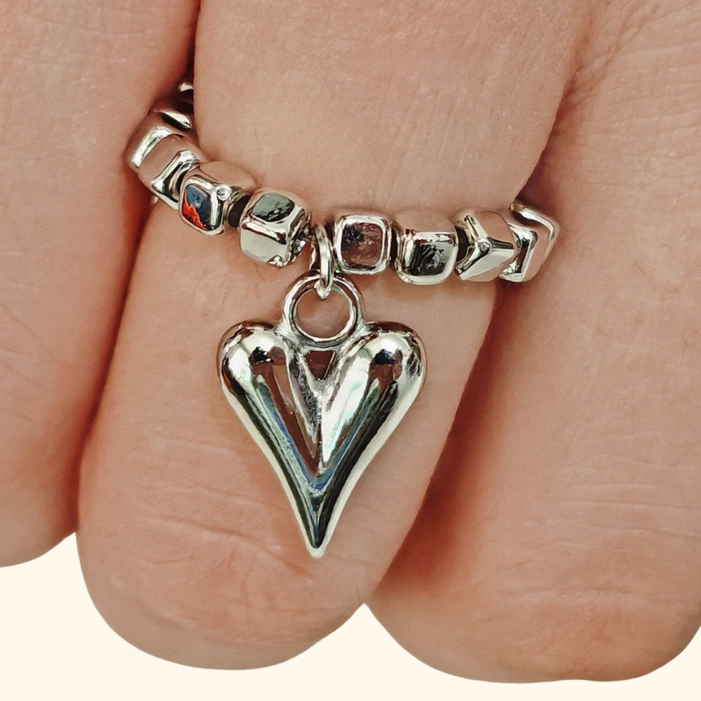 Anillo corazón colgante