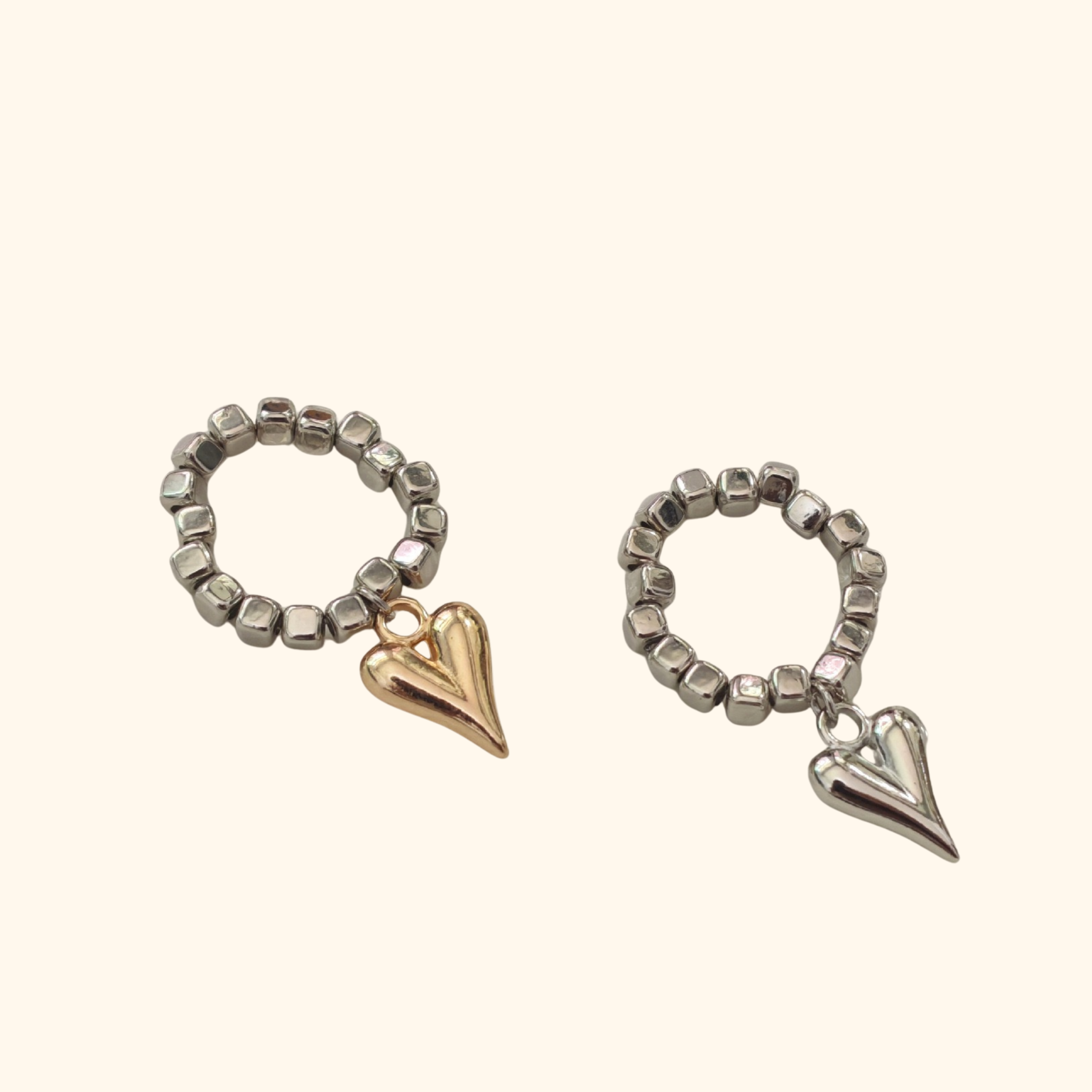Anillo corazón colgante