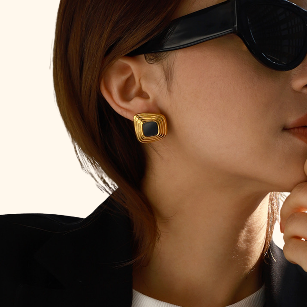 Aretes “desigual” gold